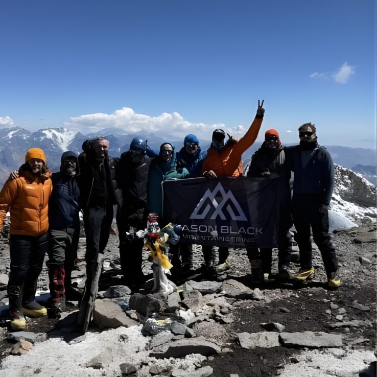 Climbers approaching Aconcagua summit at 6962 meters highest peak Western Hemisphere